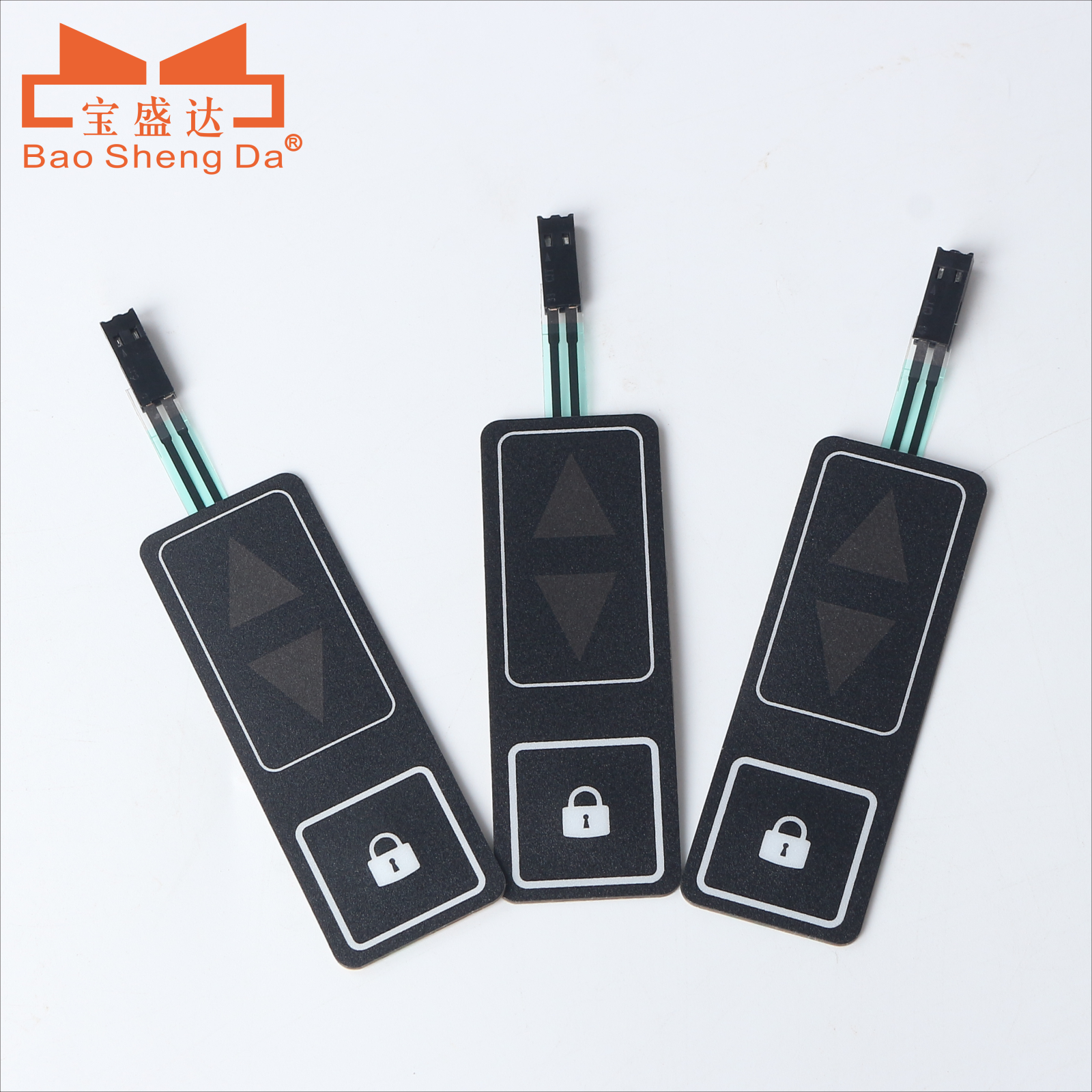 Three complete automotive door control panels with separate window-direction and lock key zones, flex tails and connectors
