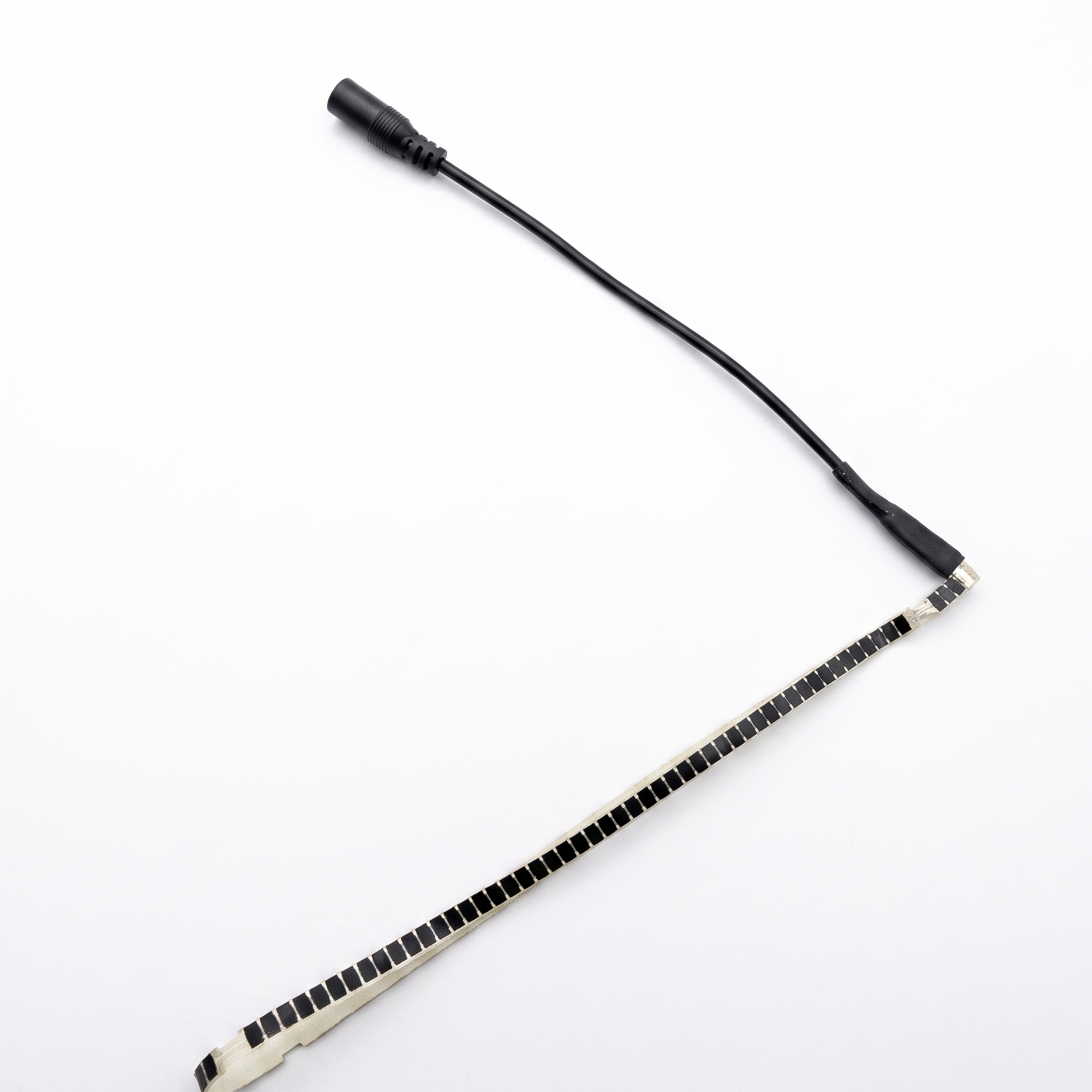 Engineering product image of a complete narrow flexible heating element with lead cable and connector for cabinet condensation-control RFQ review