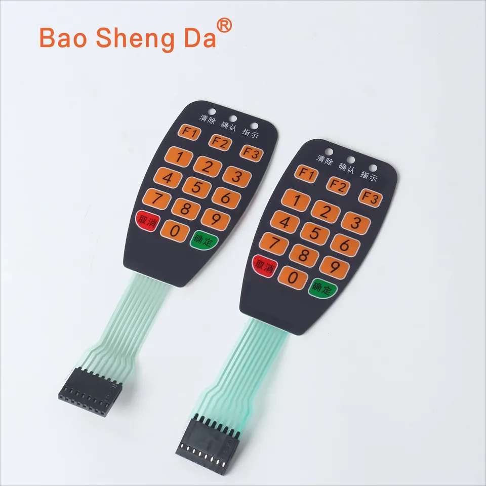 Two complete Baoshengda membrane keypads with 15 key positions, three indicator openings, flex tails and connectors
