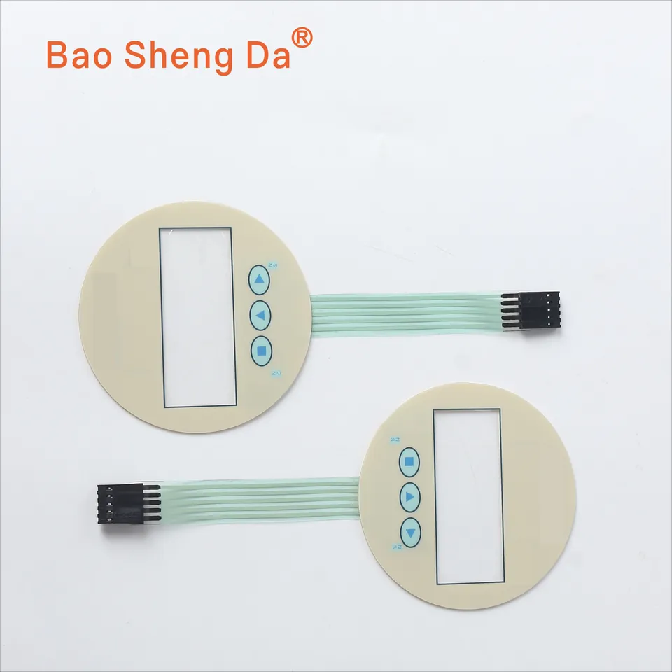 Two complete round membrane switch panels with display windows, key zones, full flexible tails and connectors