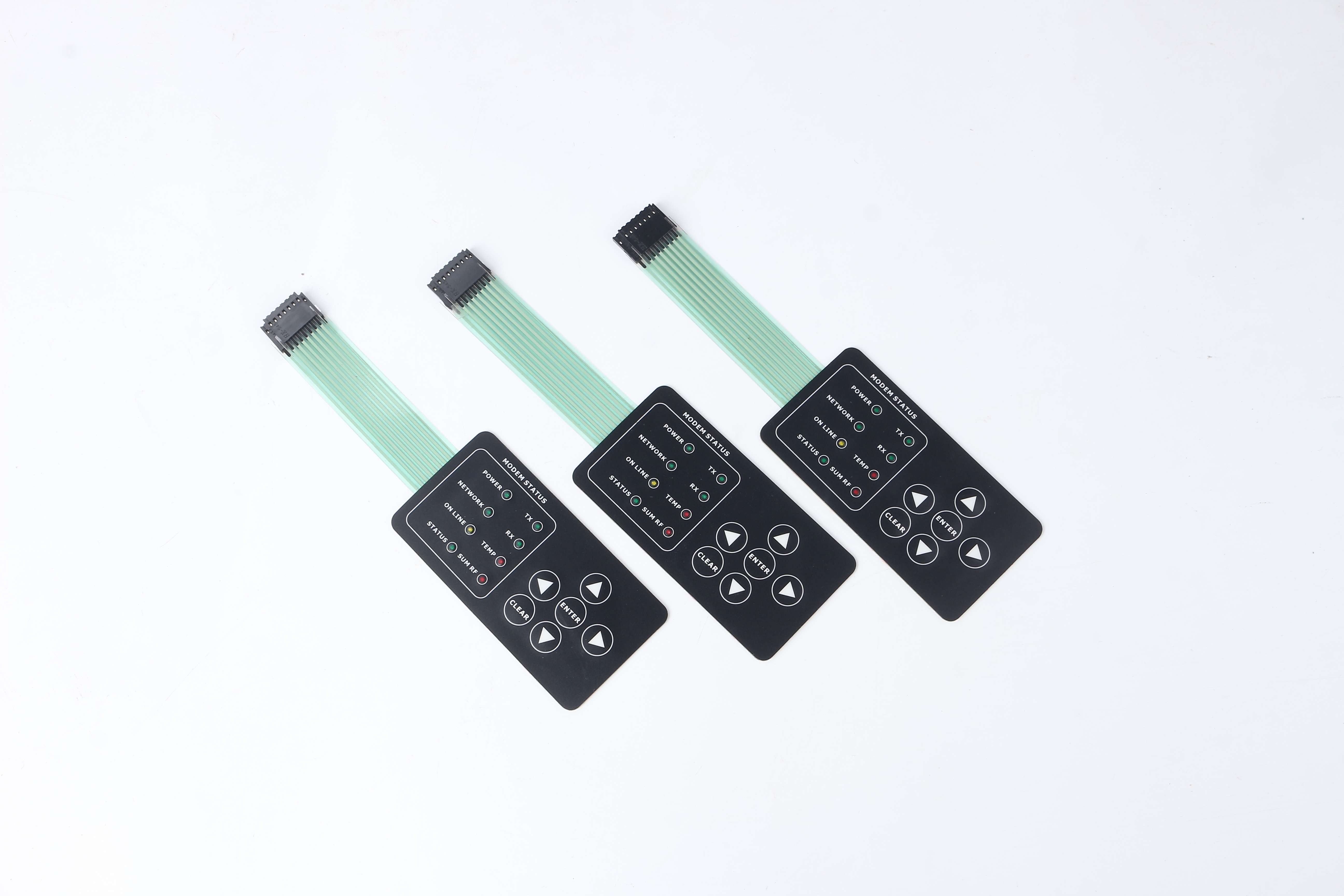 Three complete matching membrane switch samples with multiple key zones, indicator fields, full tails and connectors