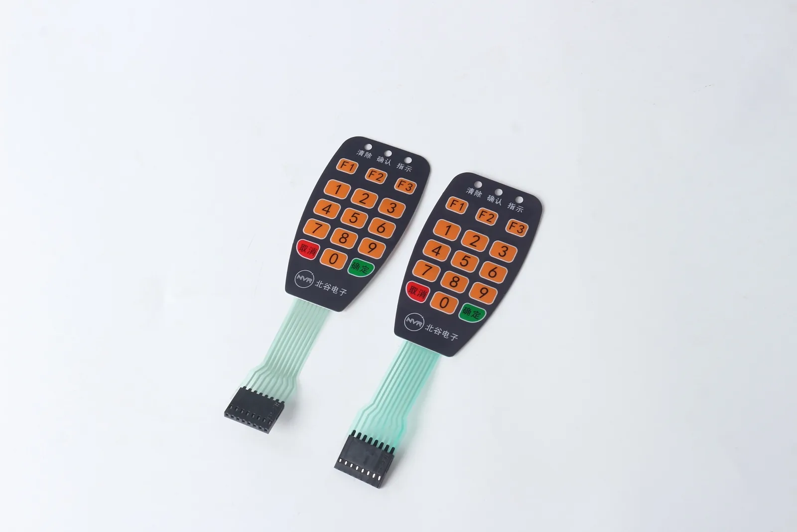 Custom membrane switch keypad samples with printed buttons, flexible tail circuits, and connectors for production approval