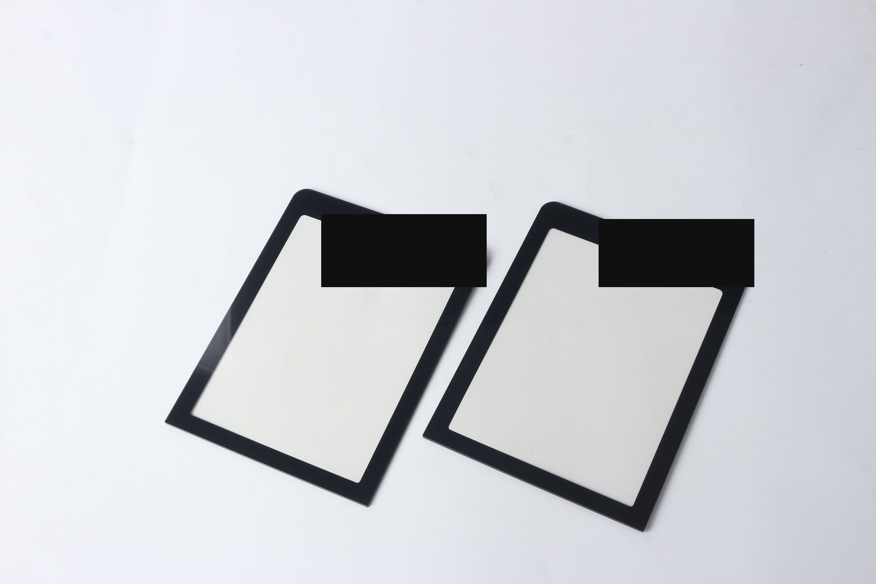 Real PET graphic overlay samples with display windows prepared for artwork and die-cut fit review