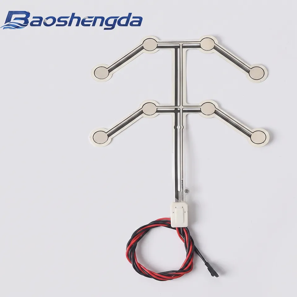 Complete multi-zone film pressure sensor with six sensing pads, printed traces, cable loop and connector