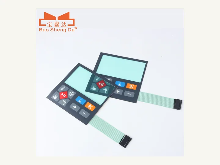 Two custom graphic overlay panels with printed keys, display windows and flexible tails